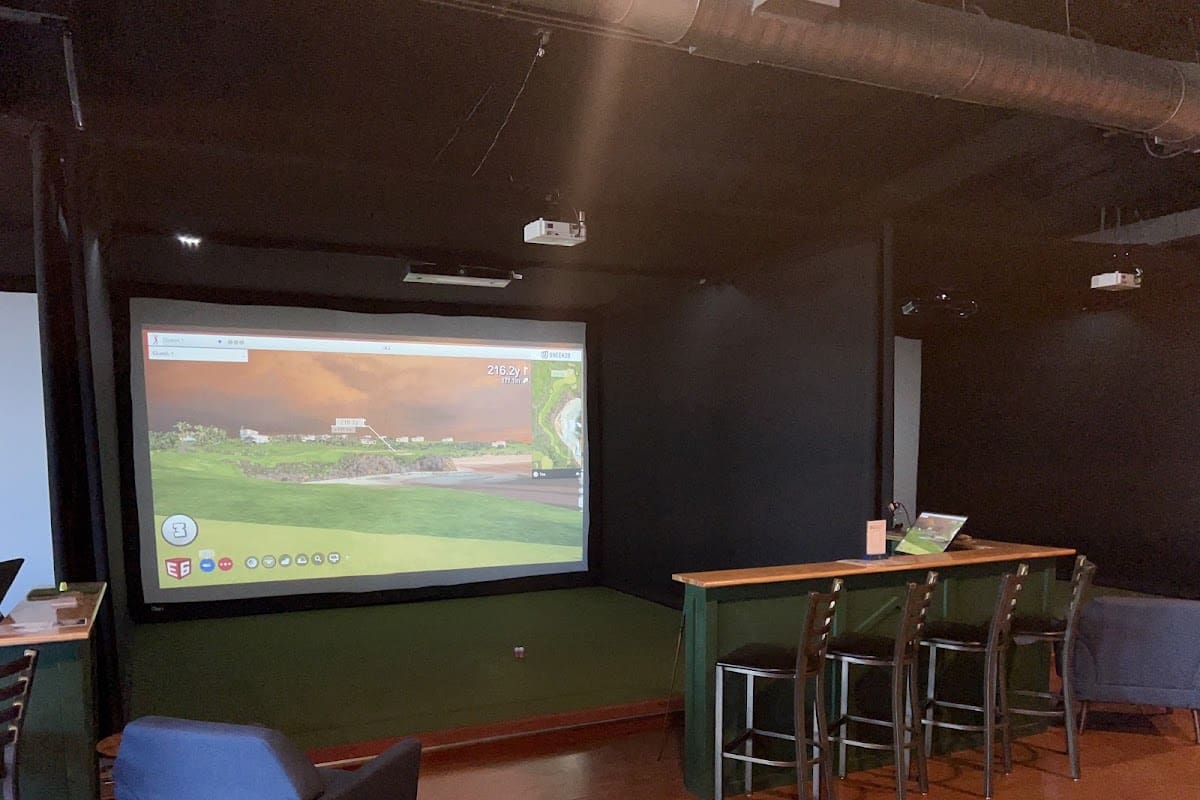 Golf simulator bay at Backspin Social | Indoor Golf & Bar in Wilmington