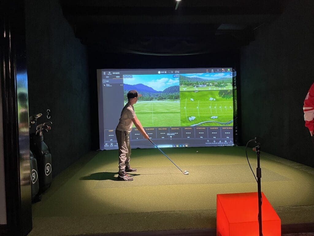 Inside Five Iron Golf Minneapolis - indoor golf simulator venue