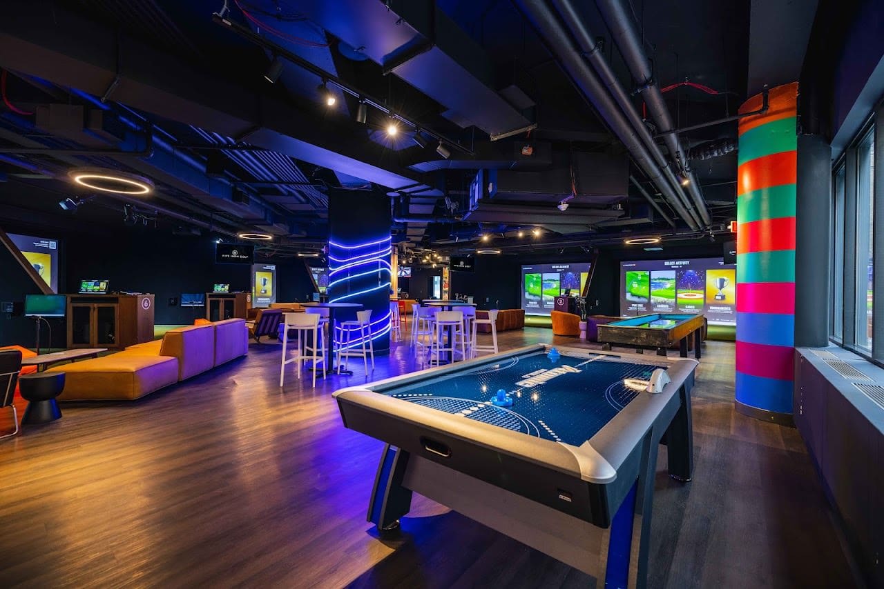 Simulator bays at Five Iron Golf Grand Central in Midtown Manhattan