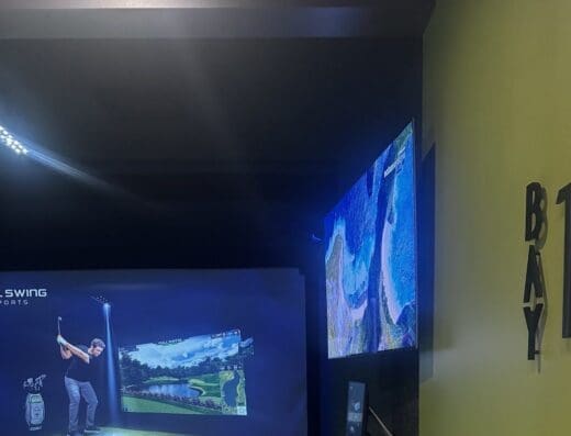 A bay with TV at The Back Nine Golf in Poway, CA